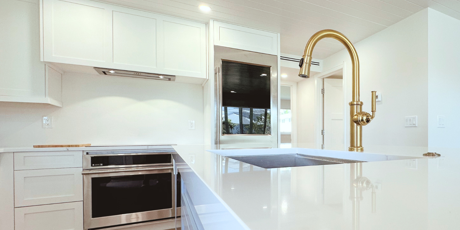 coastal white kitchen brass hardware naples florida sawgrass construction group